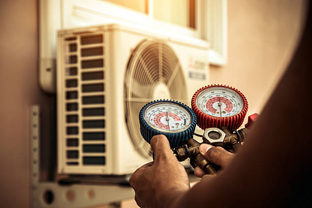 Professional Air Conditioning Service technician working in Ramah, CO